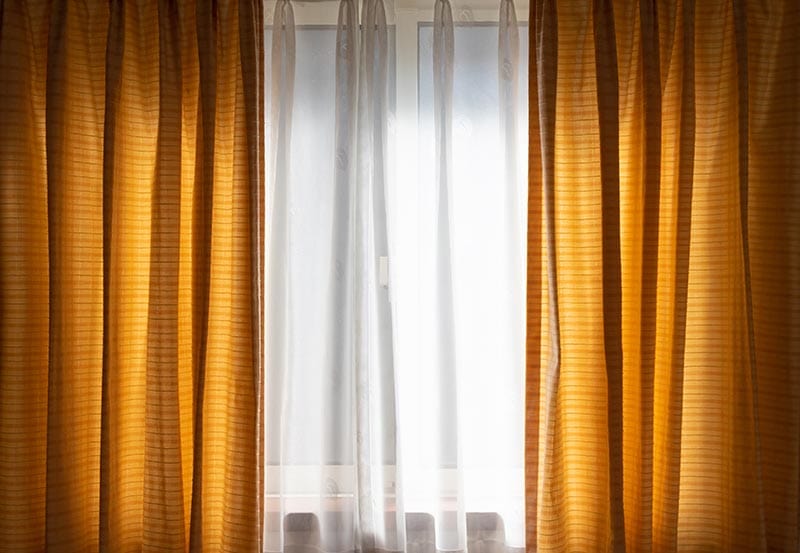 A bright window illuminated by daylight coming from behind.