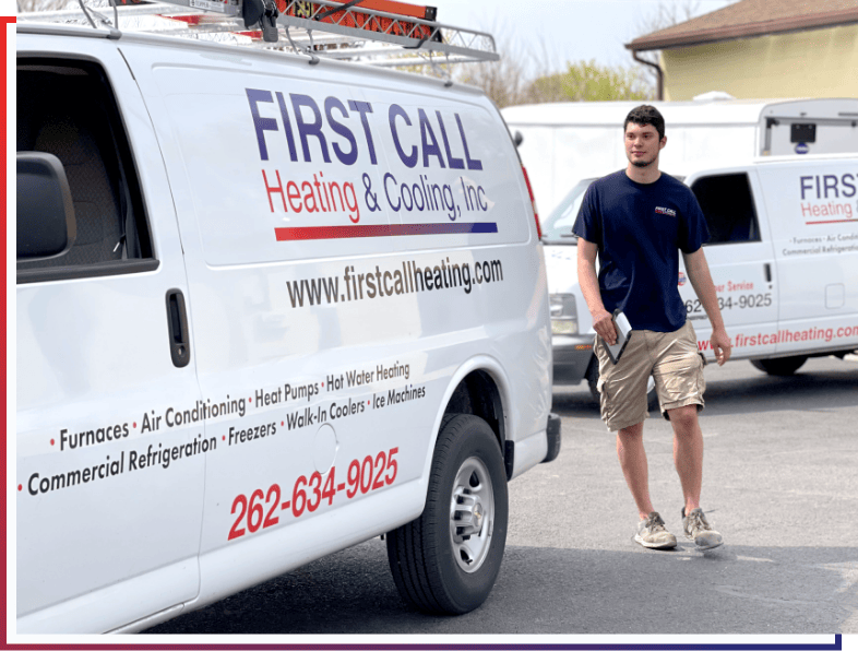 First Call Heating & Cooling employee walking to driver's side of vehicle in Racine, WI.